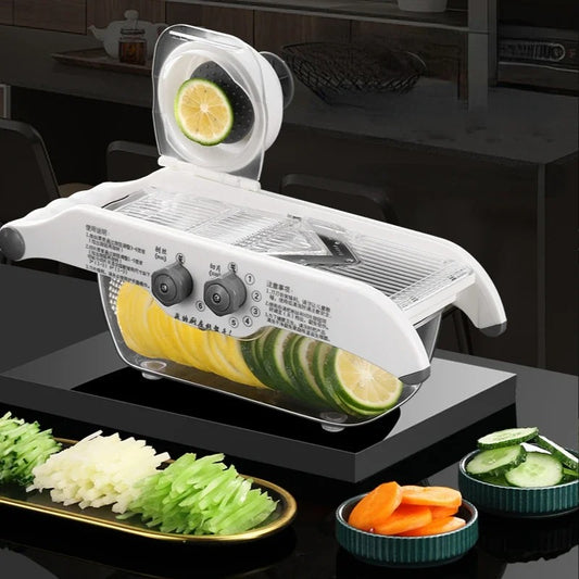 Outil de cuisine multifonctionnel avec sa lame en V son reservoir sa poignée son couvercle de protection 