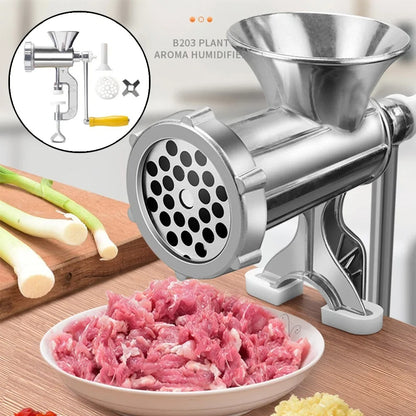 Hachoir à viande manuel en acier inoxydable accroché à la table 