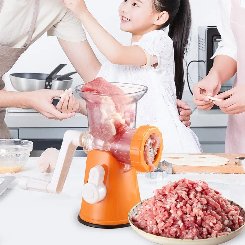 Hachoir à viande manuel multifonction avec son récipient transparent ou la viande va  être broyer 