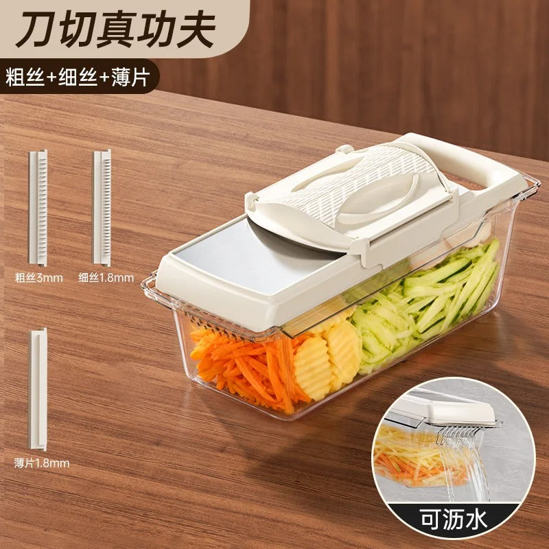 Trancheuse à légumes portable  appareil avec ses trois  lames et son rebord pour évacuer l'eau 