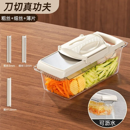 Trancheuse à légumes portable  appareil avec ses trois  lames et son rebord pour évacuer l'eau 