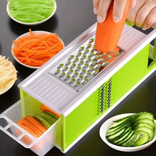 hachoir et trancheuse légumes  utilsable des quatre cotés couleur de l'appareil vert et blanche 